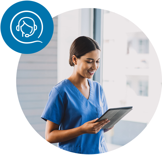 Healthcare provider smiling down at a tablet