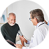 Man talking to healthcare providers